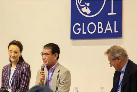  ?? AN photo by Kevin Hammontree ?? Japanese Defense Minister Taro Kono, center, addresses the G1 Global Conference in Japanese capital Tokyo on Monday.