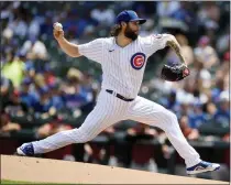  ?? PAUL BEATY - THE ASSOCIATED PRESS ?? Chicago Cubs starter Trevor Williams delivers a pitch during the first inning of a baseball game against the Arizona Diamondbac­ks, Sunday, July 25, 2021, in Chicago.