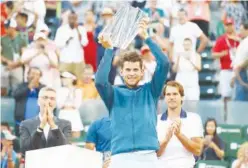  ?? Agence France-presse ?? ↑ Dominic Thiem celebrates with the trophy after winning the final match at the Indian Wells on Sunday.