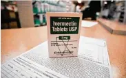  ?? Mike Stewart / Associated Press ?? The FDA has tried to debunk claims that animalstre­ngth versions of the drug can help fight COVID.