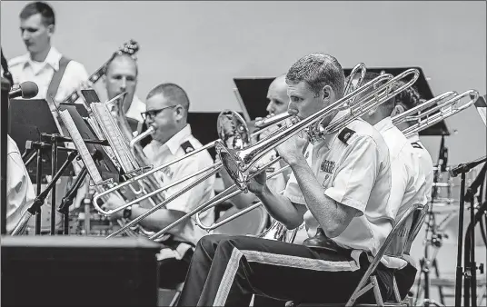  ?? [FILE PHOTO] ?? Sunday on the Village Green in Worthingto­n: the 122nd Ohio Army National Guard Band