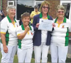  ??  ?? From left, Ashford Rail’s Linda Greenhalgh, Anne Rutland, Gill Hawkes and Mo Hayes. Right, Gill Hawkes (left) receives her county badge from Kent President Sylvia Taylor