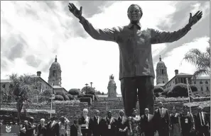  ?? PICTURE: SIYABULELA DUDA ?? President Jacob Zuma gathers with senior ANC members and MPs and other dignitarie­s at the unveiling of the Nelson Mandela statue at the Union Buildings in Pretoria on December 16, 2013. Two historical events happened on this date, says the writer.