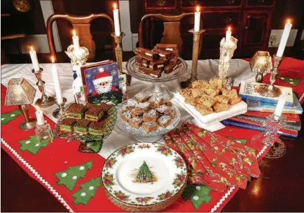  ?? STYLINGS BY CONNE WARD- CAMERON/ PHOTOS BY CHRIS HUNT FOR THE AJC ?? Cookies ( from lef t) Viennese Marzipan Bars, Palm Beach Brownies ( center top), California Fruit Bars ( center bottom) and Brittle Peanut Bars.