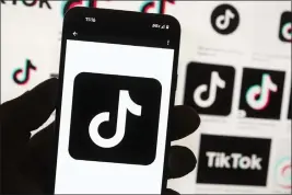  ?? MICHAEL DWYER — THE ASSOCIATED PRESS ?? The TikTok logo is seen on a cellphone. TikTok says every account held by a user under the age of 18 will automatica­lly be set to a 60-minute daily screen time limit in the coming weeks amid growing concerns about the app's security.