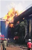  ?? PHOTO: PTI ?? Firefighte­rs look on as the fire rises after a blast at the Bhilai Steel Plant of stateowned SAIL in Durg on Tuesday