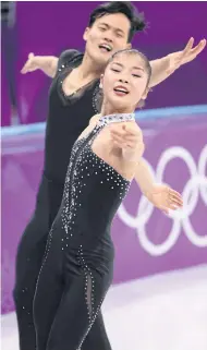  ??  ?? ON THIN ICE: Tae Ok-ryom and Ju Sik-kim during the free skate portion of the pairs figure skating event at the 2018 Winter Olympics.