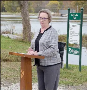  ?? (NWA Democrat-Gazette/Graham Thomas) ?? Siloam Springs Mayor Judy Nation speaks during a ribbon-cutting ceremony for the fishing pier and kayak launch.