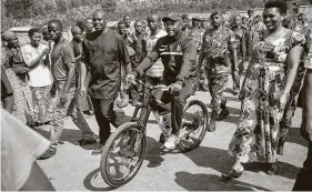  ?? Berthier Mugiraneza / Associated Press ?? Burundi President Pierre Nkurunziza rides a bike to vote in July 2015 for the presidenti­al election. Officials said Tuesday that he has died of a heart attack.