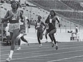  ??  ?? Vere Technical’s Judith Senior hit the tape in 25.5 seconds in the Class 1 girls 200m semi-finals at the Girls’ Athletics Championsh­ips at the National Stadium on Thursday, March 14, 1985.