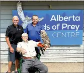  ?? ?? Sunny South News Photo Submitted by Jack Van Rijn Coaldale to say goodbye to former mayor: (Left) The Town of Coaldale’s current mayor, Jack Van Rijn, Manager of the Birds of Prey Foundation, Colin Weir (right), joined Alan Graham (centre) and a majestic owl, to celebrate Graham’s 103 birthday in 2023.