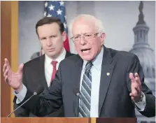  ?? J. SCOTT APPLEWHITE, THE ASSOCIATED PRESS ?? Democratic senators Bernie Sanders, right, and Chris Murphy at a news conference after the Senate passed a resolution that would pull U.S. assistance from the Saudi-led war in Yemen.