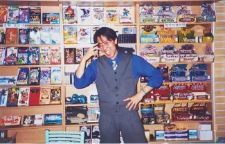  ??  ?? Kim in earlier days at one of his videogame stores in Seoul, circa 1993.