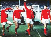  ??  ?? England players with the 1966 World Cup trophy.