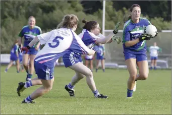  ??  ?? Aine Cahill and Sorcha Doyle of St Patrick’s chase down AGB’s Annmarie Keegan.