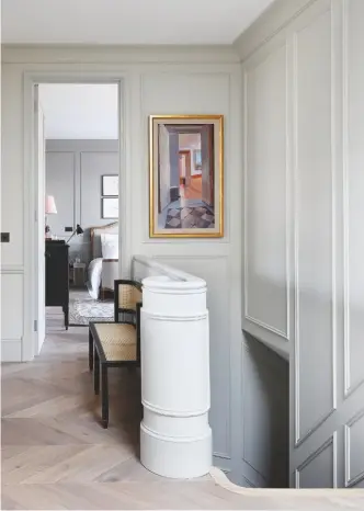  ??  ?? HALLWAY
The stunning bespoke staircase exudes period elegance and the artwork is highlighte­d by its position in the panelling. Banister designed by De Rosee Sa and made by Sobart Constructi­on & Joinery. Bespoke bench, De Rosee Sa. Artwork, commission­ed by De Rosee Sa