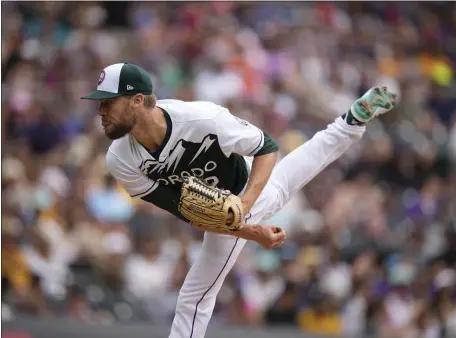 ?? DAVID ZALUBOWSKI — THE ASSOCIATED PRESS ?? Colorado Rockies relief pitcher Daniel Bard (52) in the seventh inning of a baseball game Saturday, June 10, 2023, in Denver.