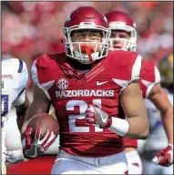  ?? Arkansas Democrat-Gazette/BENJAMIN KRAIN ?? Devwah Whaley (above) and Rawleigh Williams are one of the SEC’s top returning running back tandems. “Those two guys, man, they’re very gifted,” Arkansas Coach Bret Bielema said.