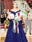  ??  ?? Lincoln senior Abby Goldman showcases her newly-won Colors Day 2020 crown during Friday’s festivitie­s at Wolfpack Arena prior the basketball games against Greenland. She is the daughter of Kelly and Ryan Goldman.