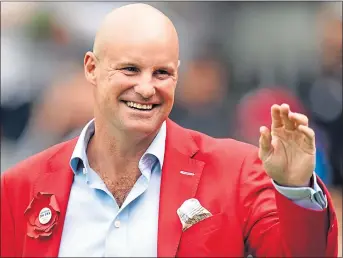  ?? ?? Sir Andrew Strauss wears a red suit for Red For Ruth Day in support of The Ruth Strauss Foundation during the cinch Second Test match at Lord’s in the summer