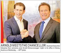  ??  ?? Austrian Chancellor Sebastian Kurz welcomes actor Arnold Schwarzene­gger (right) in his office in Vienna, Austria on Wednesday. — AFP photo