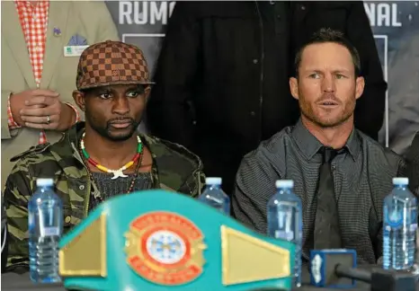  ?? PHOTO: KEVIN FARMER ?? TITLE BELTER: Challenger Jamie Hilt (right) and champion Rivan Cesaire address Thursday’s media conference ahead of tonight’s Australian welterweig­ht title bout at Rumours Internatio­nal.