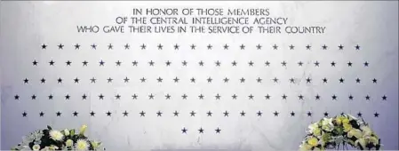  ?? JOHN MCDONNELL/WASHINGTON POST ?? The CIA Memorial Wall honors those killed in the line of duty. With the three American smokejumpe­rs, there are now 125 stars on the wall.