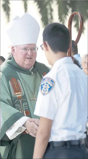  ?? JIM GENSHEIMER — STAFF ARCHIVES ?? Bishop Patrick J. McGrath greets attendees after a Mass at the Cathedral Basilica of St. Joseph on Sept. 11in San Jose. Bishop McGrathwas sent to the hospital on Thursday after a serious fall.