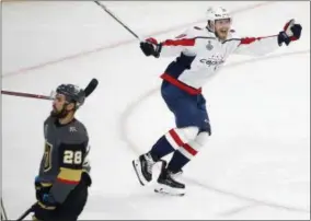  ?? ROSS D. FRANKLIN - THE ASSOCIATED PRESS ?? FILE - In this June 7, 2018, file photo, Washington Capitals center Lars Eller, right, celebrates his goal as Vegas Golden Knights left wing William Carrier skates away during the third period in Game 5 of the NHL hockey Stanley Cup Finals in Las Vegas.