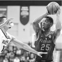  ?? GARY MCCULLOUGH/ASSOCIATED PRESS ?? Freshman Keith Stone (25) is one part of a deep bench for the 24th-ranked Gators.