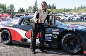  ?? CITIZEN PHOTO BY JAMES DOYLE ?? Sheldon Mayert poses with his new trophy Sunday at PGARA Speedway after winning the 100-lap WESCAR main event.