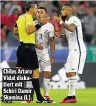  ??  ?? Chiles Arturo Vidal diskutiert mit Schiri Damir Skomina (l.).