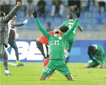  ??  ?? Players and officials of Nigeria’s home-based Super Eagles celebrate their qualificat­ion for the final after beating Sudan 1-0 in the semi-final on Wednesday night in Marrakech. Adepoju says early goals will unsettle Morocco in tomorrow’s final