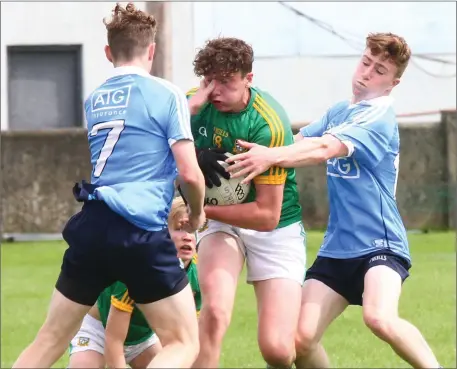 ??  ?? Meath’s Jack O’Connor comes in for some tough treatment from the Dublin defence.