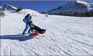  ?? (DR) ?? « Une belle sensation de vitesse », dit Bénédicte qui a testé le tandem-ski.