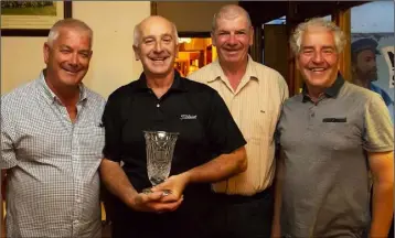  ??  ?? The Three Bullet Gate Society presentati­on of the Phyllis O’Riordan trophy (from left): Ger O’Riordan, John Kehoe (winner), Bob O’Riordan, Michael Lee (Captain).