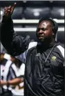  ?? Arkansas Democrat-Gazette/ MITCHELL PE MASILUN ?? Coach Cedric Thomas calls a play during the University of Arkansas at Pine Bluff’s spring football game Saturday.