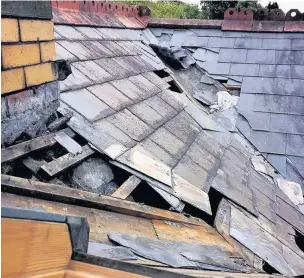  ??  ?? The damage to the roof of Mental Health Matters in Bridgend