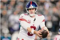  ?? Matt Rourke/Associated Press ?? New York Giants QB Daniel Jones plays during an NFL divisional round playoff game on Jan. 21 in Philadelph­ia. The Giants signed Jones to a long-term deal on March 7.