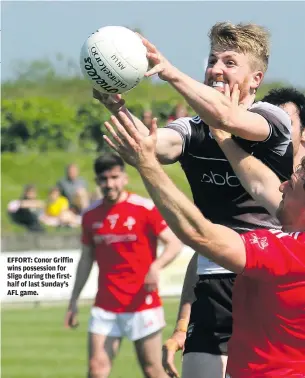  ??  ?? EFFORT: Conor Griffin wins possession for Sligo during the firsthalf of last Sunday’s AFL game.