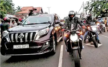 ?? ?? At a time when millions of Sri Lankan are forced to suffer economic hardships, a high-speed charity rally comprising scores of fuel-guzzling luxury vehicles and motorbikes provoked public anger and social media outrage. Pic by Hiran Priyankara Jayasinghe