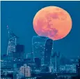  ??  ?? A ‘blood moon’ over the City of London