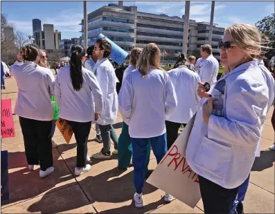  ?? (Arkansas Democrat-Gazette/Colin Murphey) ?? Healthcare profession­als attend a reproducti­ve rights rally on the steps of the state Capitol on Sunday.