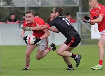  ?? ?? Aidan Boyle challenges Newtownbut­ler’s Donal Mcdade.