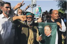  ?? Reuters ?? Supporters of ex-prime minister Nawaz Sharif celebrate after the Islamabad High Court suspended his sentence yesterday