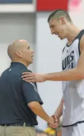  ?? AP ?? Nate Bjorkgren (left, with Alex Len) landed his first NBA head-coaching job with the Pacers.