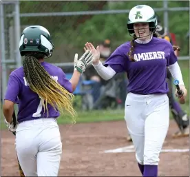  ?? RANDY MEYERS — FOR THE MORNING JOURNAL ?? Jordan Hawkins of Amherst, right, is congratula­ted by Brianna Sadler after scoring against Avon Lake on May 3.