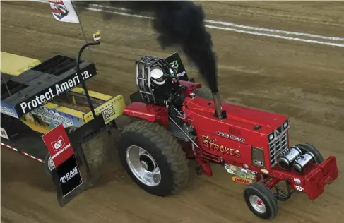  ??  ??  A 337-foot pull gave Jeff Fleck the Hot Farm Tractor class win for Friday night.
