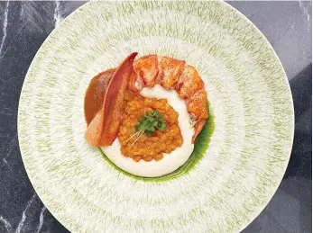 ?? La Voile Rouge ?? La Voile Rouge’s lobster risotto is a must-try dish, according to chef Junior Nadje