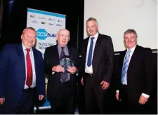  ??  ?? Stanley Nairn and Shane Dermody, Heiton Buckley, Sligo ( centre), receiving the award from Kieran Burke, President Hardware Associatio­n Ireland and Declan Smyth, Chairman, Octabuild.